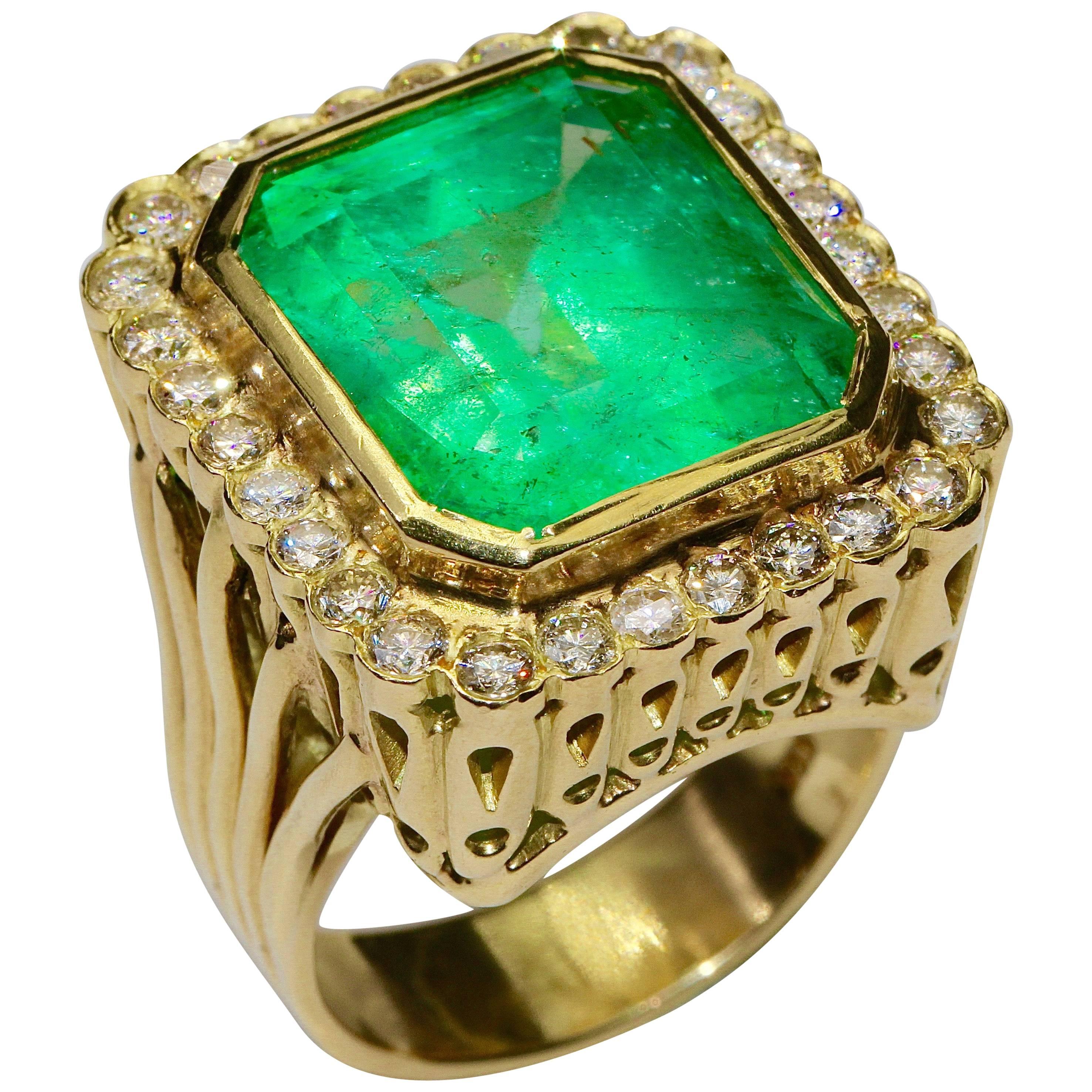 18 Karat Gold Ring with Huge 24 Carat Emerald and 30 Diamonds For Sale