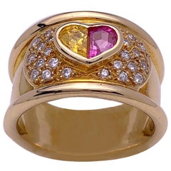 18 Karat Gold Ring with Pink and Yellow Heart Sapphire Center and Diamonds