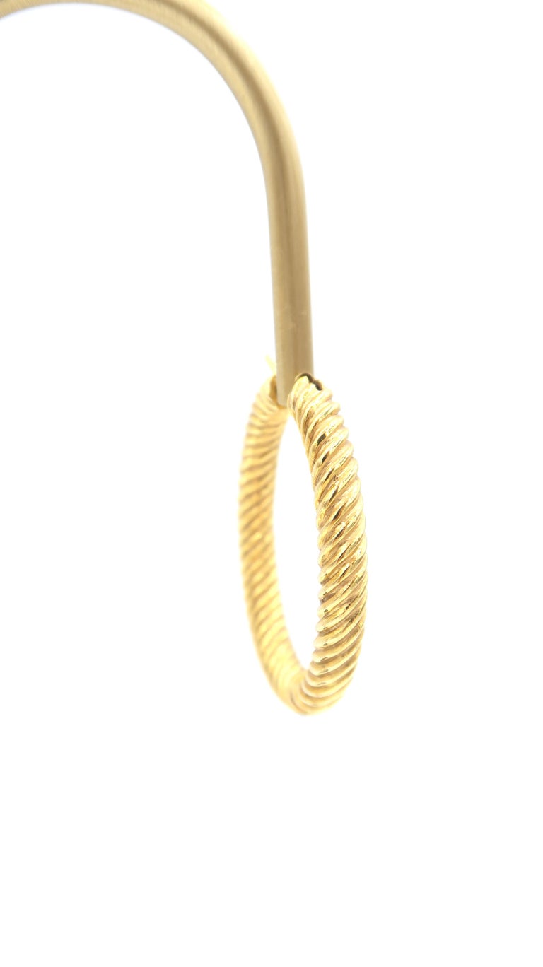 18 Karat Gold Rope Detail Oval Shaped Solid Hoop Earrings For Sale at