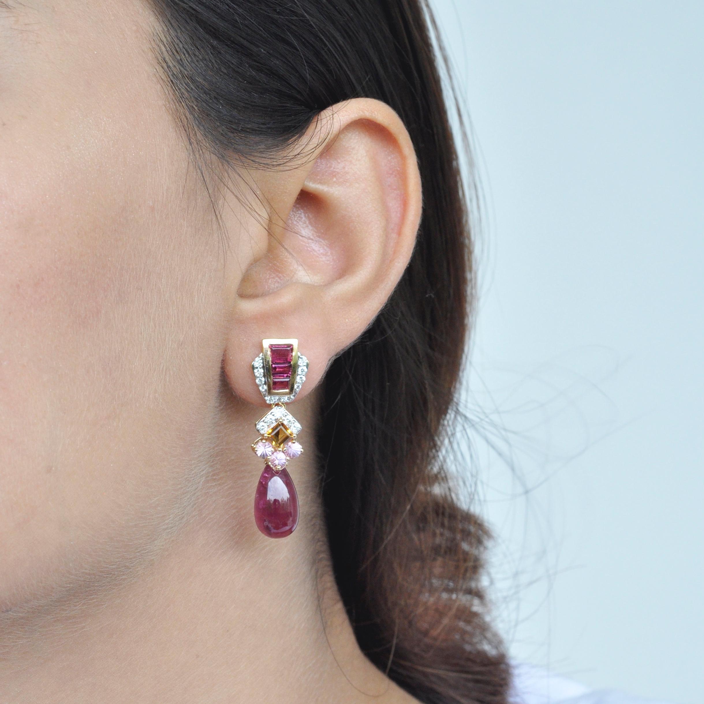 18 Karat Gold Rubellite Drop Pink Tourmaline Baguette Citrine Diamond Earrings

Pink delight - These earrings will really cheer you up with its vibrancy and hues. Set in 18k gold, the top of the earrings feature tapered cut pink tourmaline baguettes