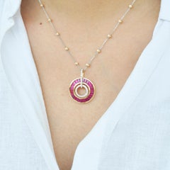 18 Karat Gold Ruby Baguettes Diamond Circular Pendant Necklace Earrings Set