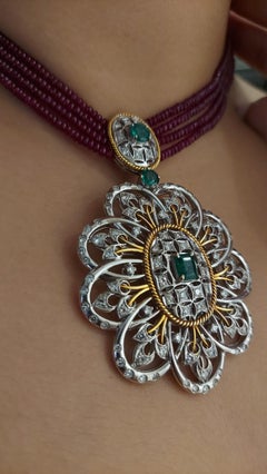 18 Karat Gold Ruby Set with Diamonds and Emeralds