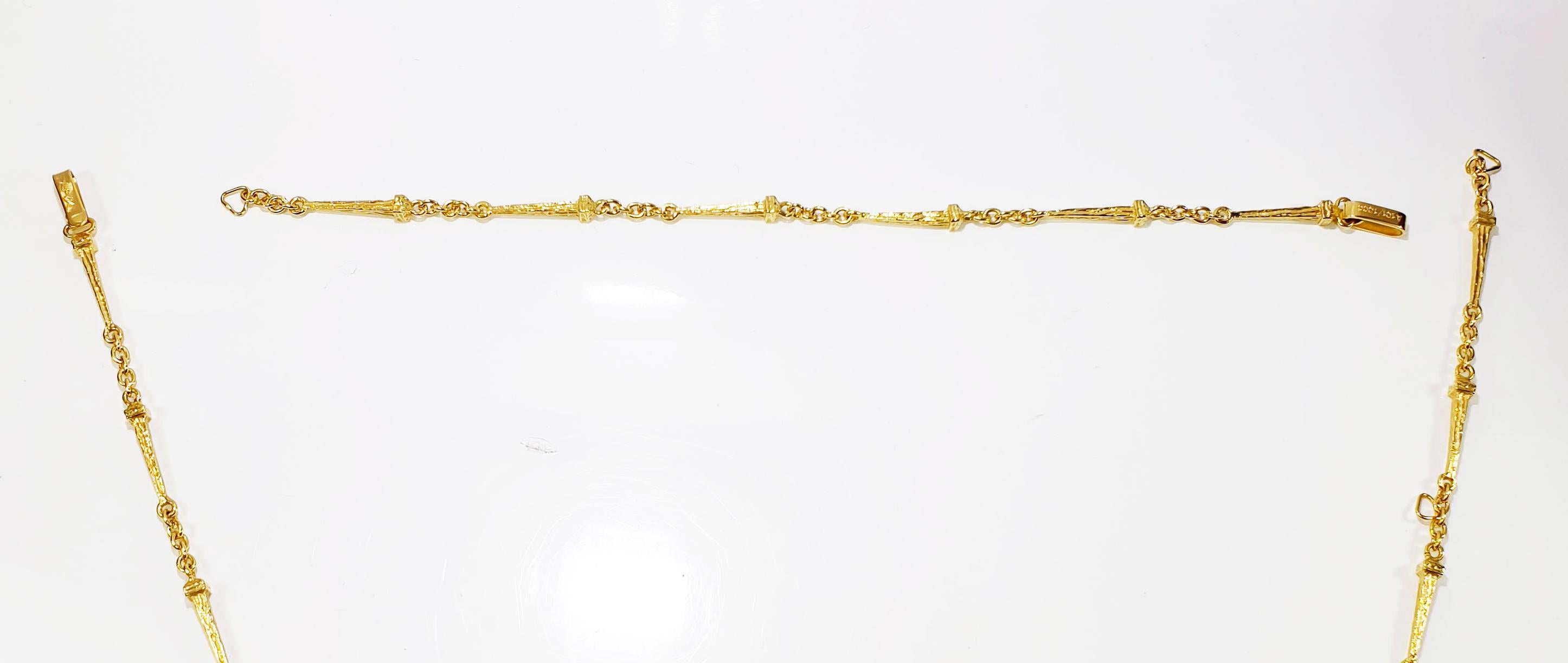 Artisan 18 Karat Gold Salvador Dalí Cristo De San Juan De La Cruz Necklace and Bracelet For Sale