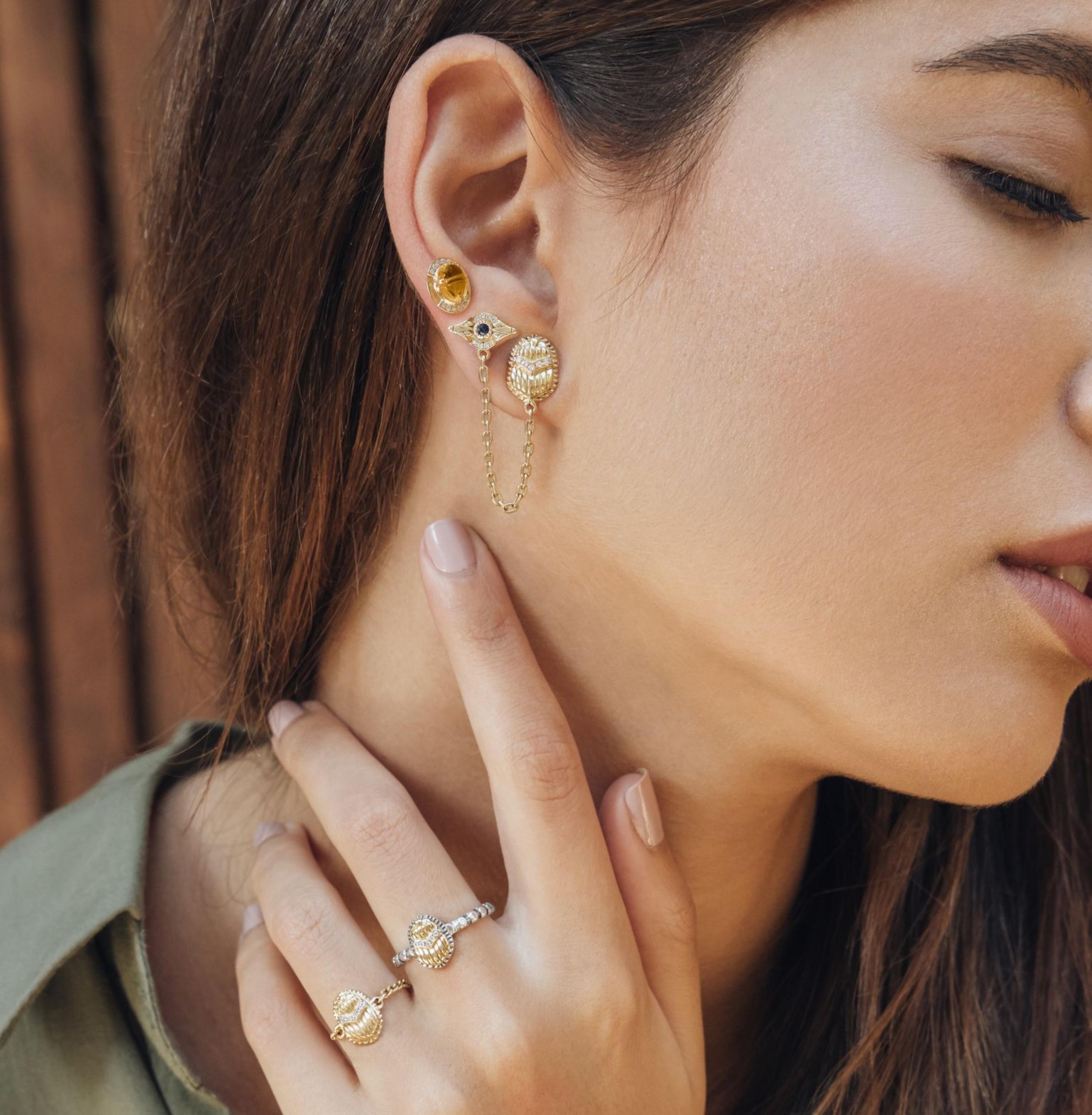 Women's 18 Karat Gold, Sapphire and Diamond Eye & Scarab Multi-Pierce Chain Stud Earring For Sale