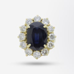 18 Karat Gold, Sapphire and Diamond Halo Ring
