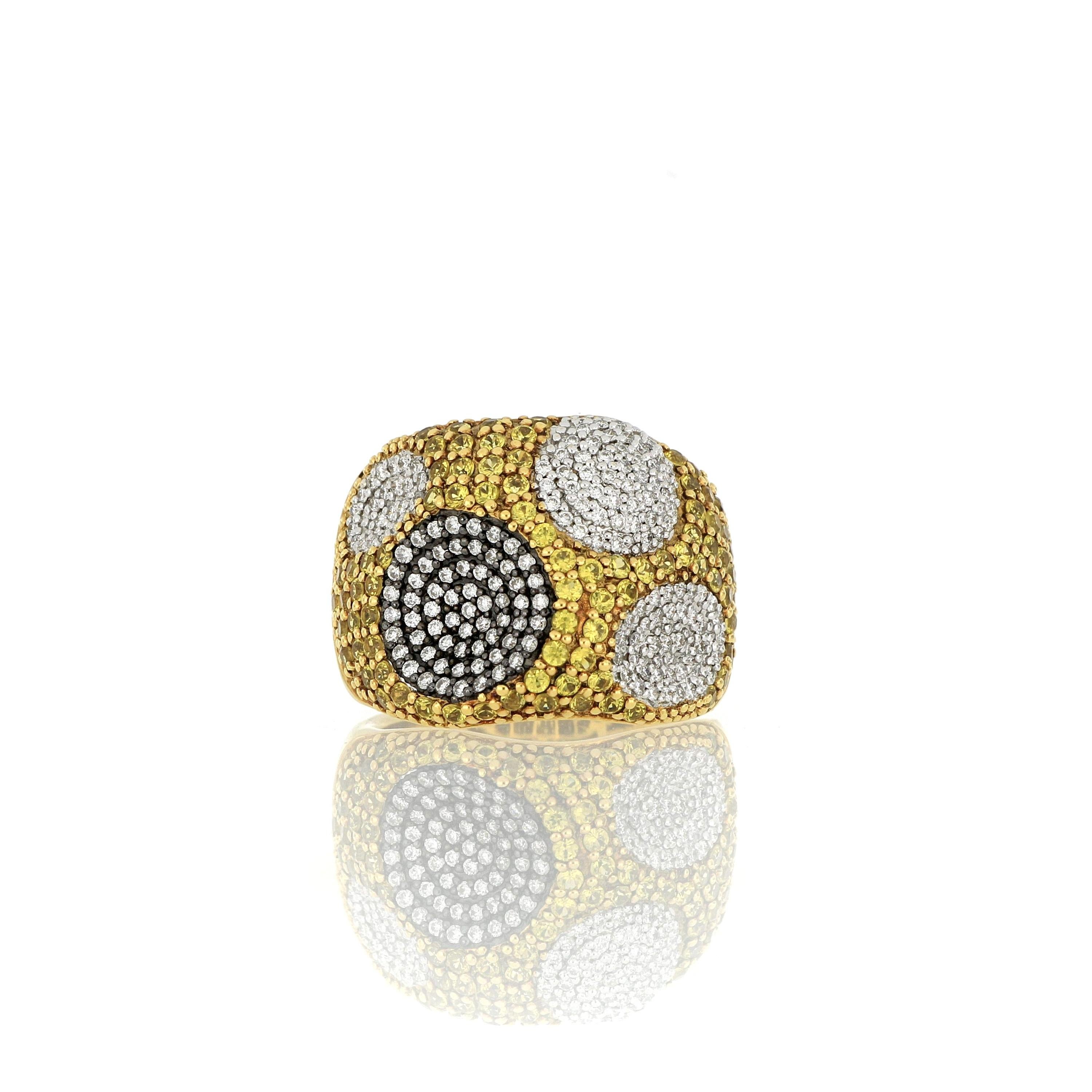 An elegant, unique and classy cocktail  ring, composed of clusters of brilliant natural yellow sapphire and diamonds, weighing approximately 1.47 carats and  0.73 carats respectively, mounted in 18 Karat gold.
O’Che 1867 is renowned for its high