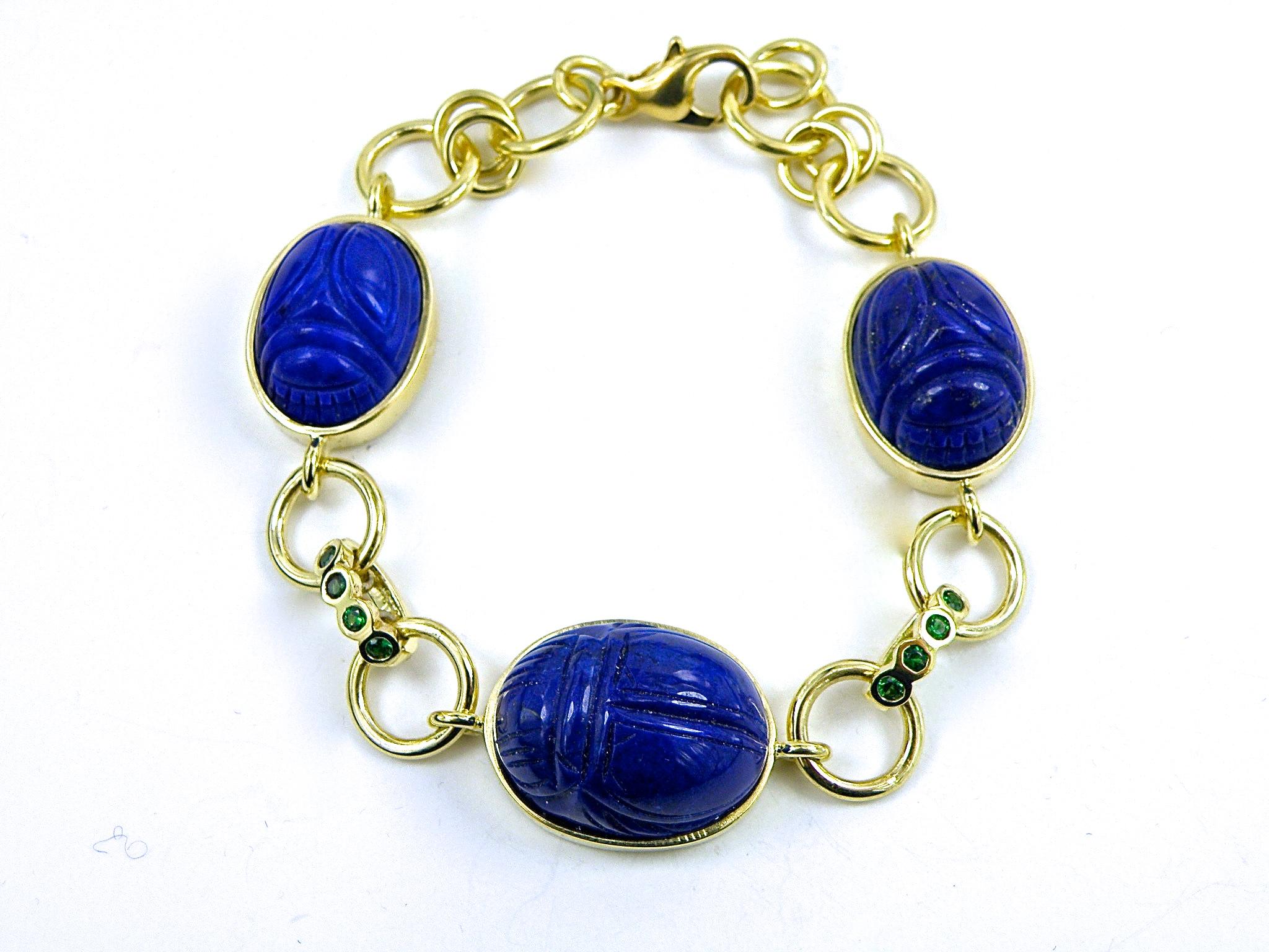 Ancient Sapphire, Lapis Lazuli and Blue Sapphire Hand carves Scarabs adorn this beautiful one of a kind bracelet.
