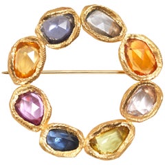 18 Karat Gold Sapphire Circle Pin or Brooch