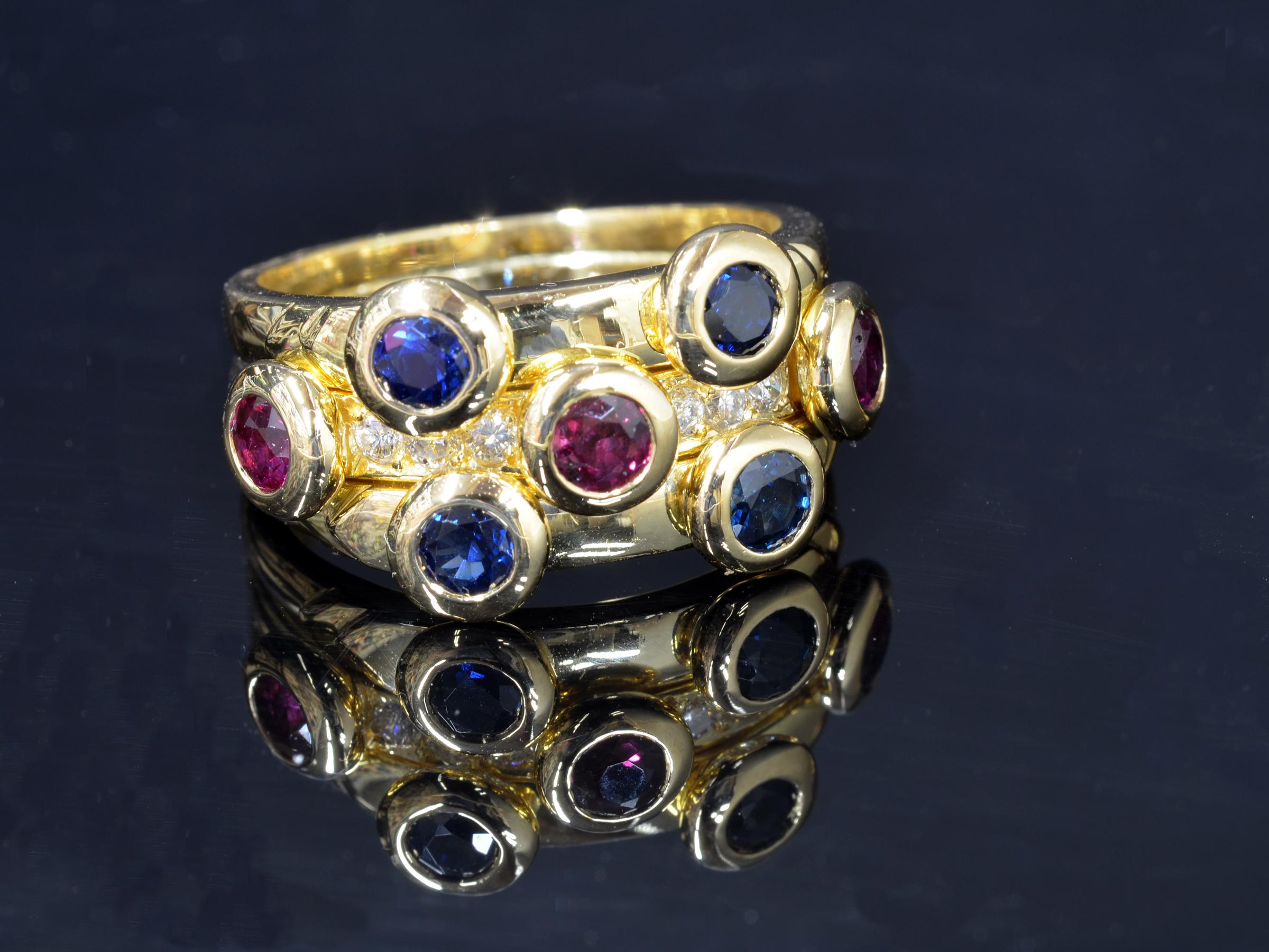 18 Karat Gold Sapphire, Ruby and Diamond Ring; Custom made 18 Kt. gold ring set with 6 Round brilliant cut Diamonds, 3 round Rubies and 4 round Sapphires, handcrafted in my studio in Maine.