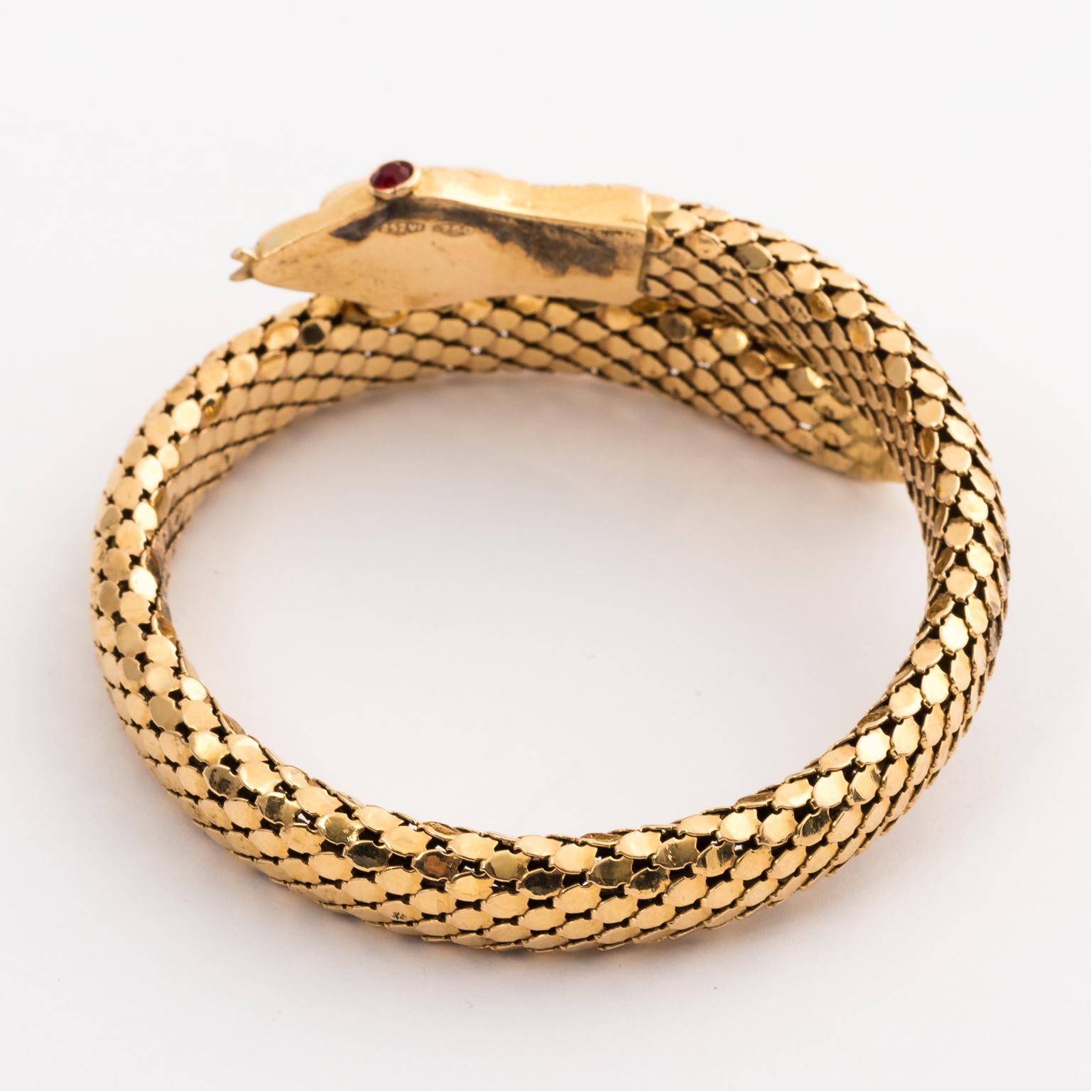 Modern 18 Karat Gold Serpent Bracelet with Ruby Eyes