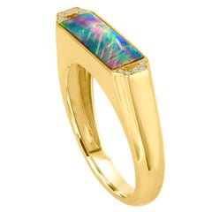Anillo de oro de 18 quilates con diamantes y ópalo de Boulder