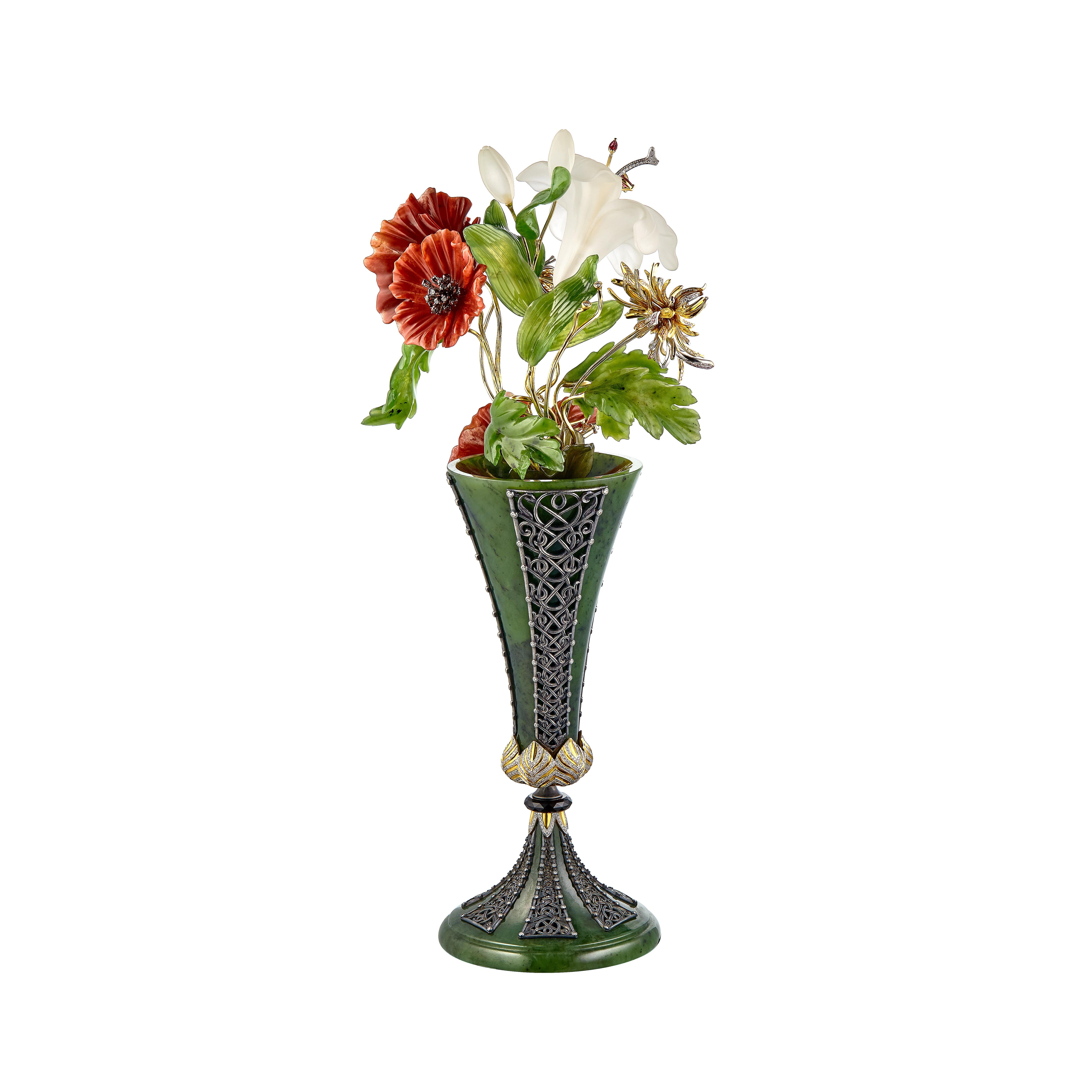 Gold floral compositions with precious or semi-precious stones or enamel became popular at the turn of the 20th century in Europe and Russia. Especially Imperial families and nobilities collected or gifted to important people.

This floral miniature