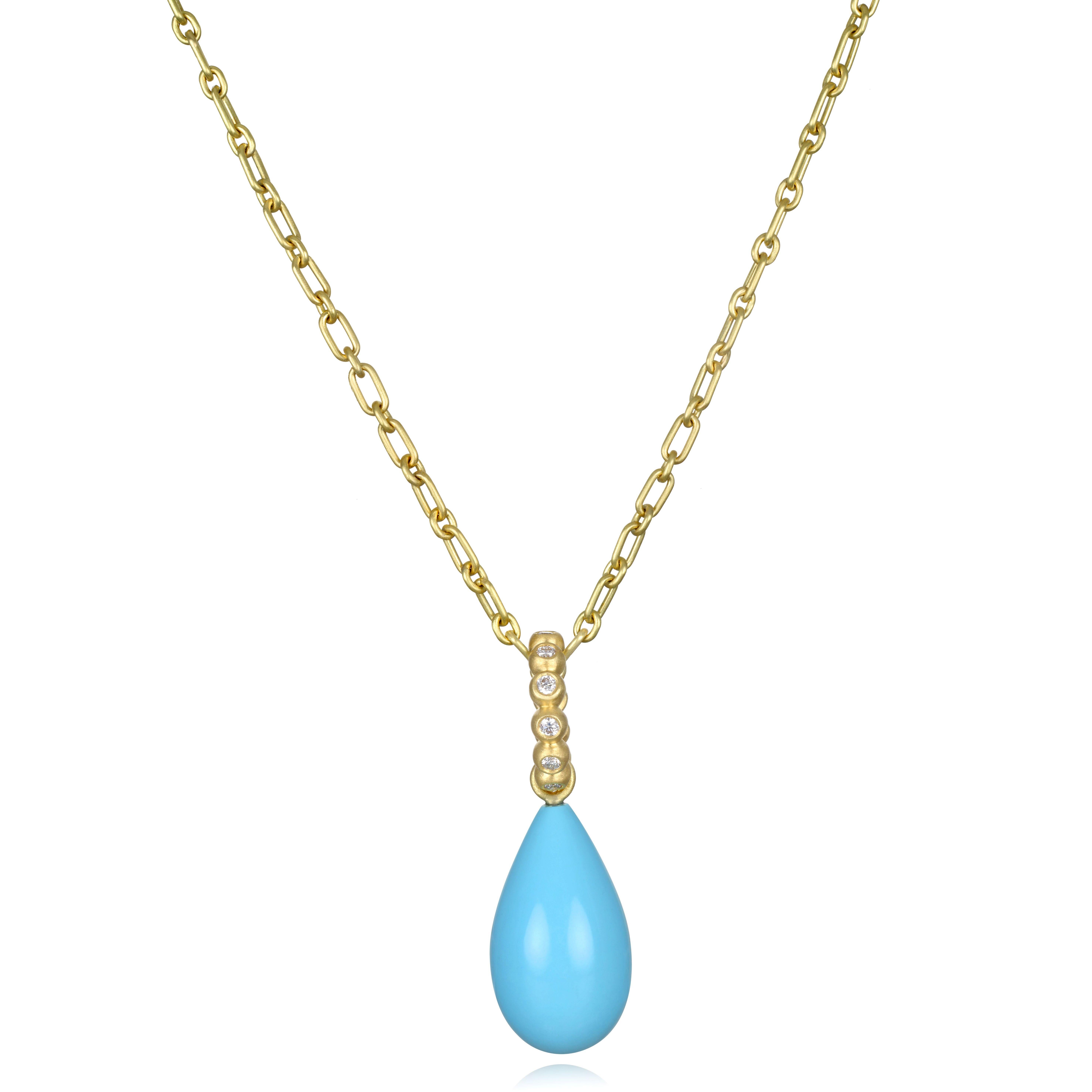 18k Gold Sleeping Beauty Turquoise Biolette Pendant with Diamond Bail

Diamond .30 tcw

Length 1.5