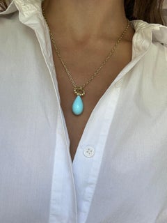 Pendentif en or 18 carats avec briolette en turquoise "Sleeping Beauty" et bague en diamant