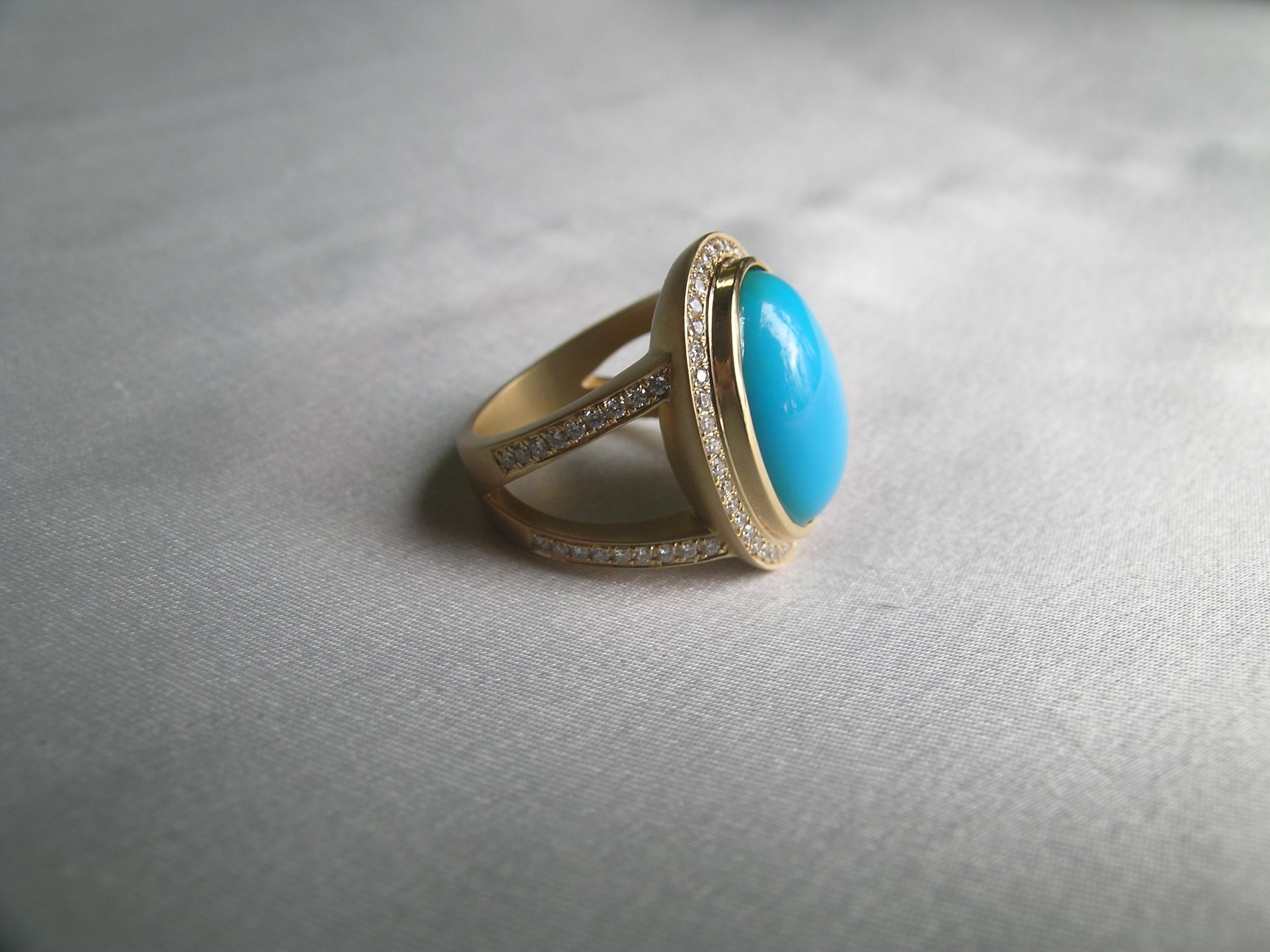 The finest turquoise in the world came from a mine in Arizona which no longer harvests turquoise.  The name is Sleeping Beauty Turquoise and is now rare.  Our last big oval piece in our inventory is used for this ring.  It is quite elegant and the