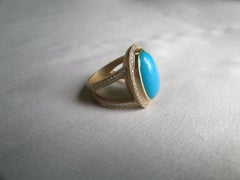 18 Karat Gold, Sleeping Beauty Turquoise and Diamond Cocktail Ring