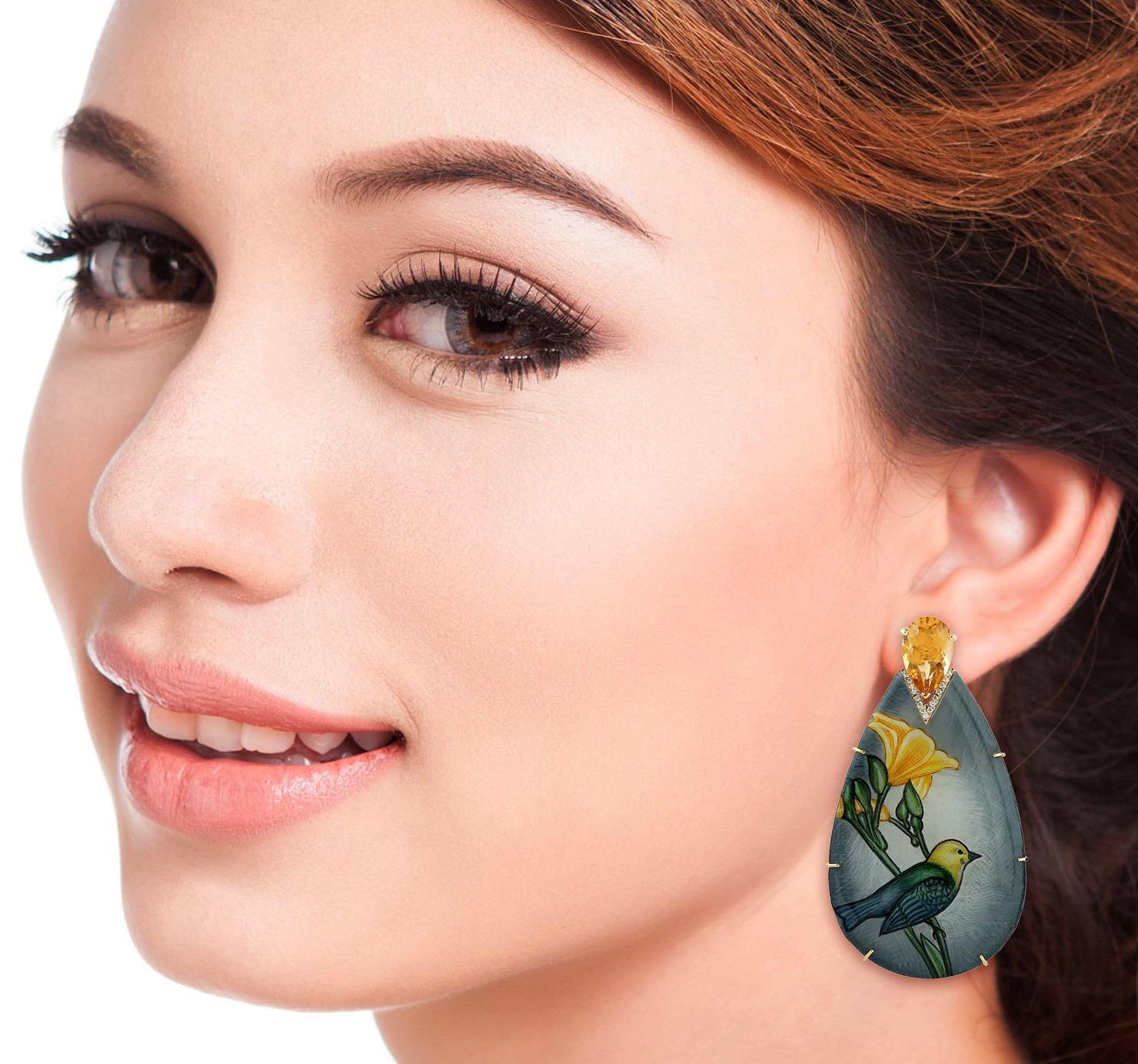 These beautiful Sparrow Enamel earrings features unique hand painted miniature art set with 18K gold. It's 8.65 carats Citrine & & 0.17 carats diamonds.

FOLLOW  MEGHNA JEWELS storefront to view the latest collection & exclusive pieces.  Meghna