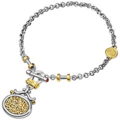 18 Karat Gold Sterling Silver and Garnet T-Lock Calligraphy Coin "Love" Bracelet