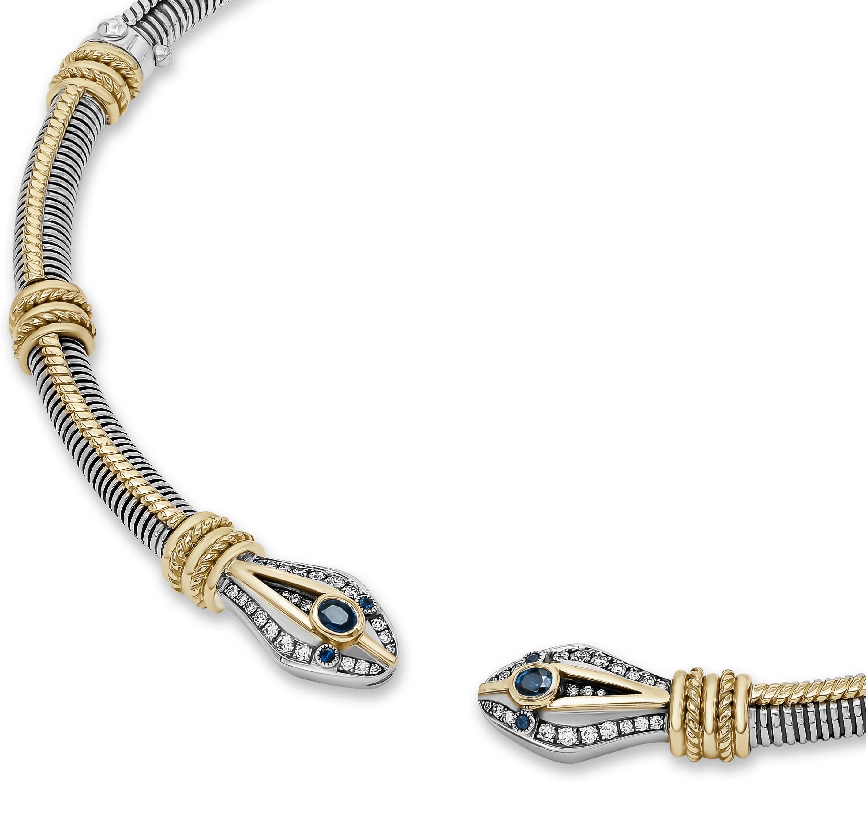 18 Karat Gold, Sterling Silver, Sapphire & Diamond Snake Choker Necklace.
Much like a snake sheds its skin, and resurrects itself anew, a designer must too shed comfort, and reawaken their wonder to recreate vision and reimagine forms. 

Sapphire: