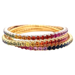 18 quilates  Pulsera elástica de oro con zafiros arco iris