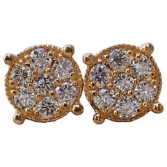 18 Karat Gold Stud Earrings are Set with 0.68 Carat of Diamond, Illusion Set