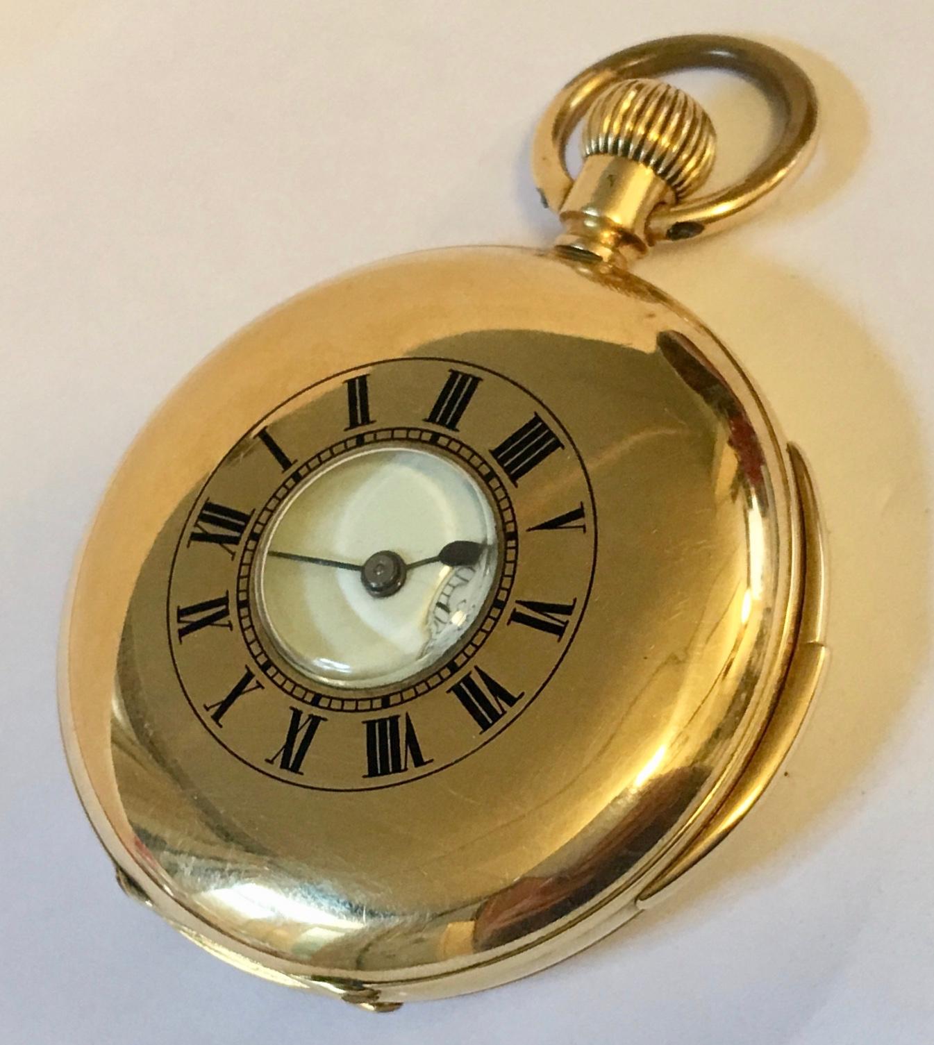 A solid 18-karat gold Swiss half hunter minute repeating pocket watch. The face has a white enamel dial with applied Roman numerals, original blue steel hands. Keyless wind lever movement, circular hinged case that opens to a 90 degree angle.