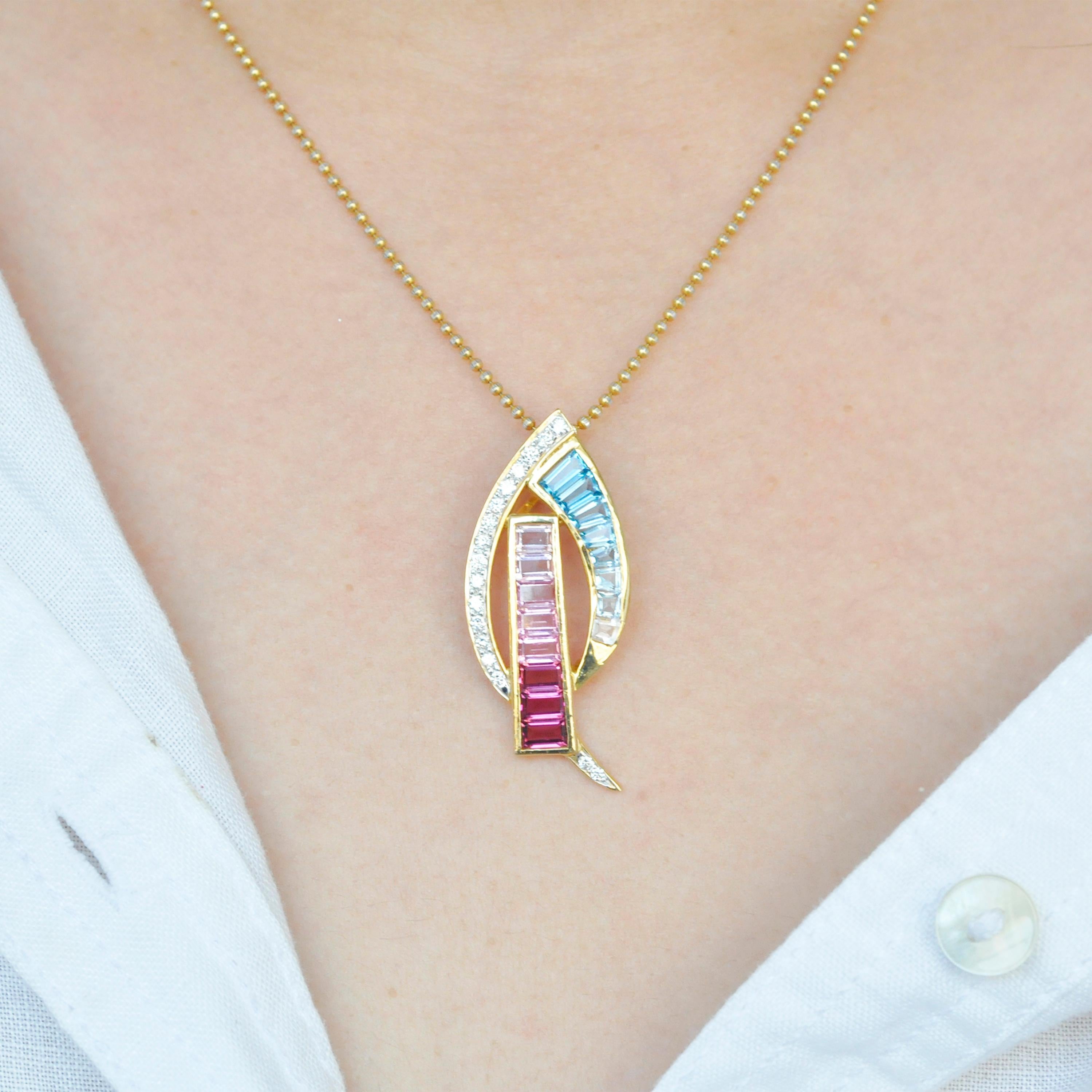18 karat yellow gold taper baguette pink tourmaline aquamarine diamond pendant necklace

This splendid piece of jewel is exquisite. In this pendant pink tourmalines and aquamarines are perfectly graded from dark to light and set in this 18 karat