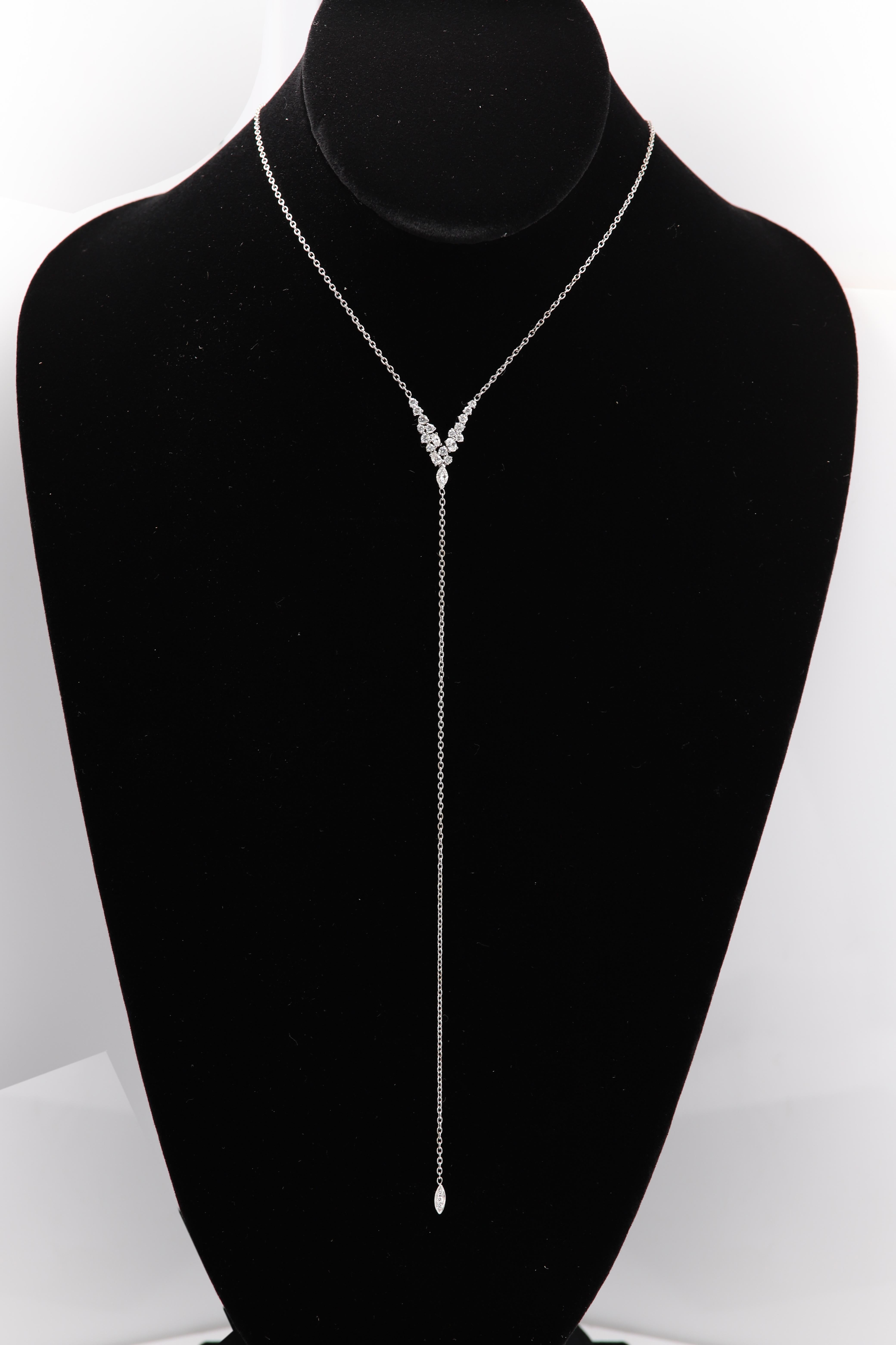 Diamond Tassel Necklace
18k White Gold 6.0 grams
center has cluster of diamonds - mix shapes
total approx 1.0 carat approx G-H-I1-SI
Length of center dangle is approx 7' inch
Overall neck Length - adjustable 16.5' - 17.5' inch
Lobster lock
Gift Box