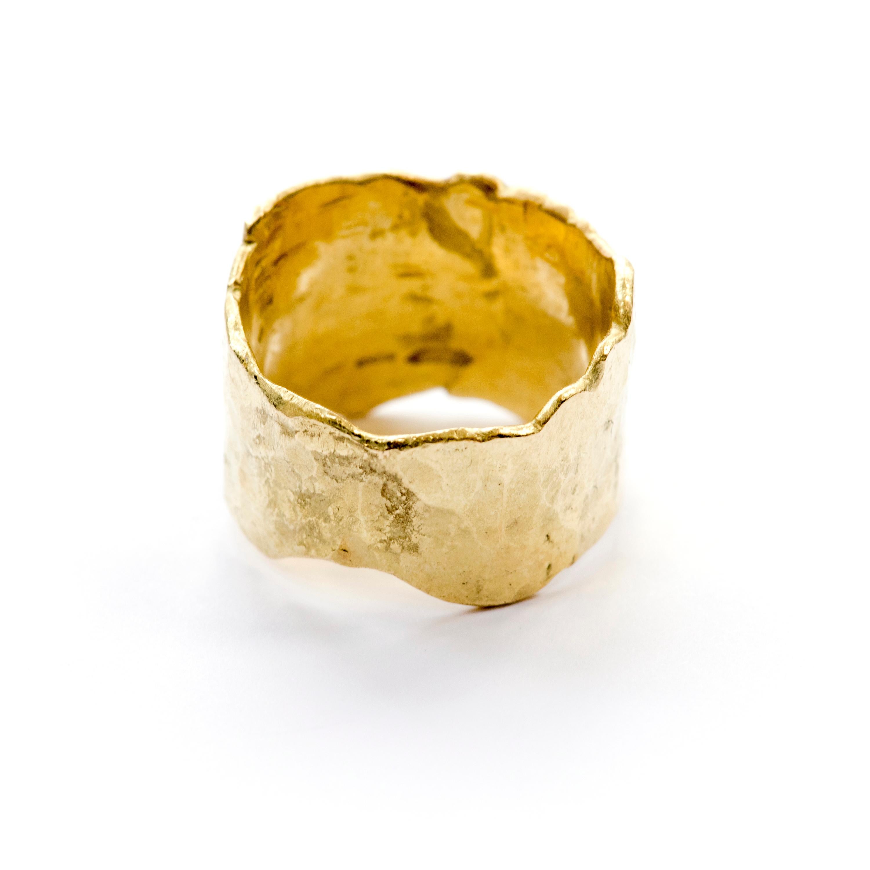 18k Gold textured wide ring. This ring is 15mm wide at its widest point and 9mm wide at the base to allow for comfort. Made using reticulation and forging techniques it is a stunning statement ring showcasing the 18k yellow gold in all its glory.