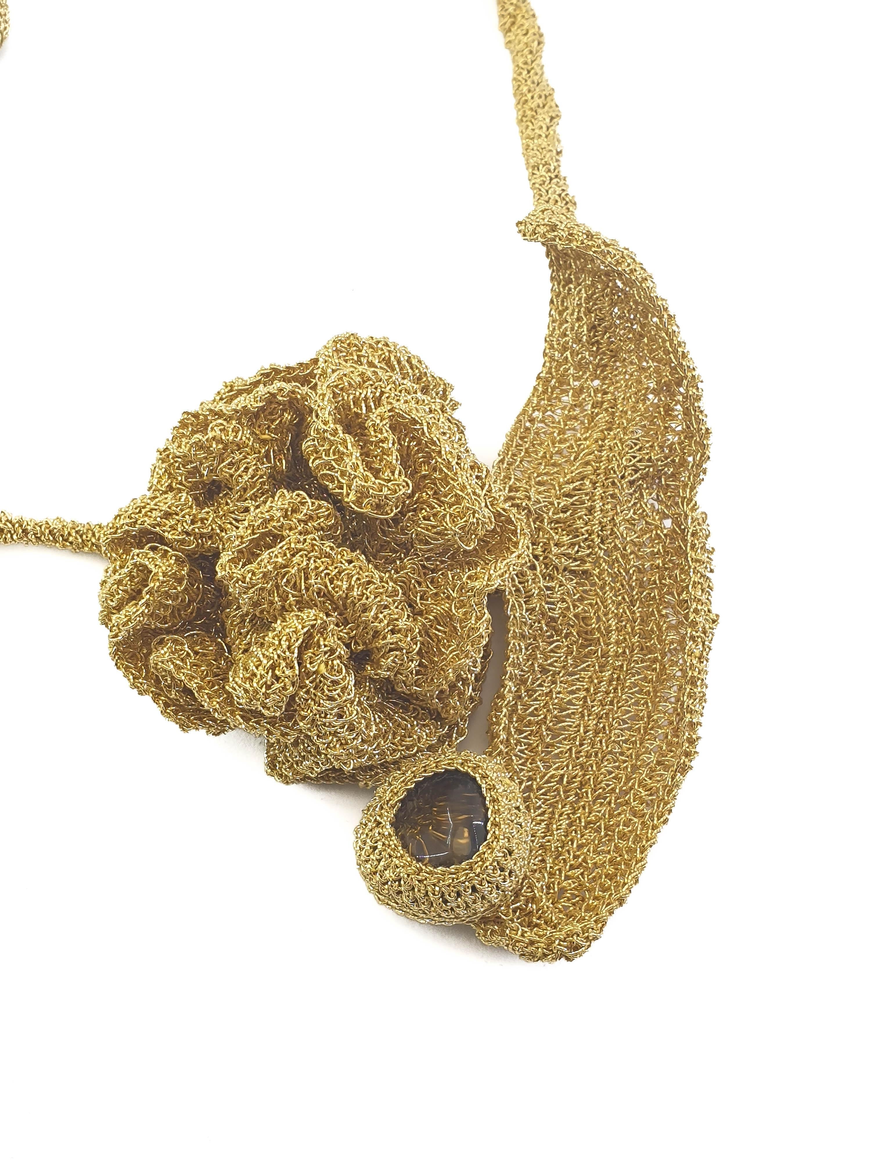 A One of a Kind hand crochet 18 karat gold thread (51.52 grams) statement necklace with a single Smokey Quartz (1.9 grams/9.5 carats). This piece will never go unnoticed. Wearable art.

Beautifully crafted hand crochet gold thread bracelet (19.82