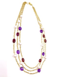 18 Karat Gold Three-Strand Pearl, Amethyst and Tourmaline Necklace