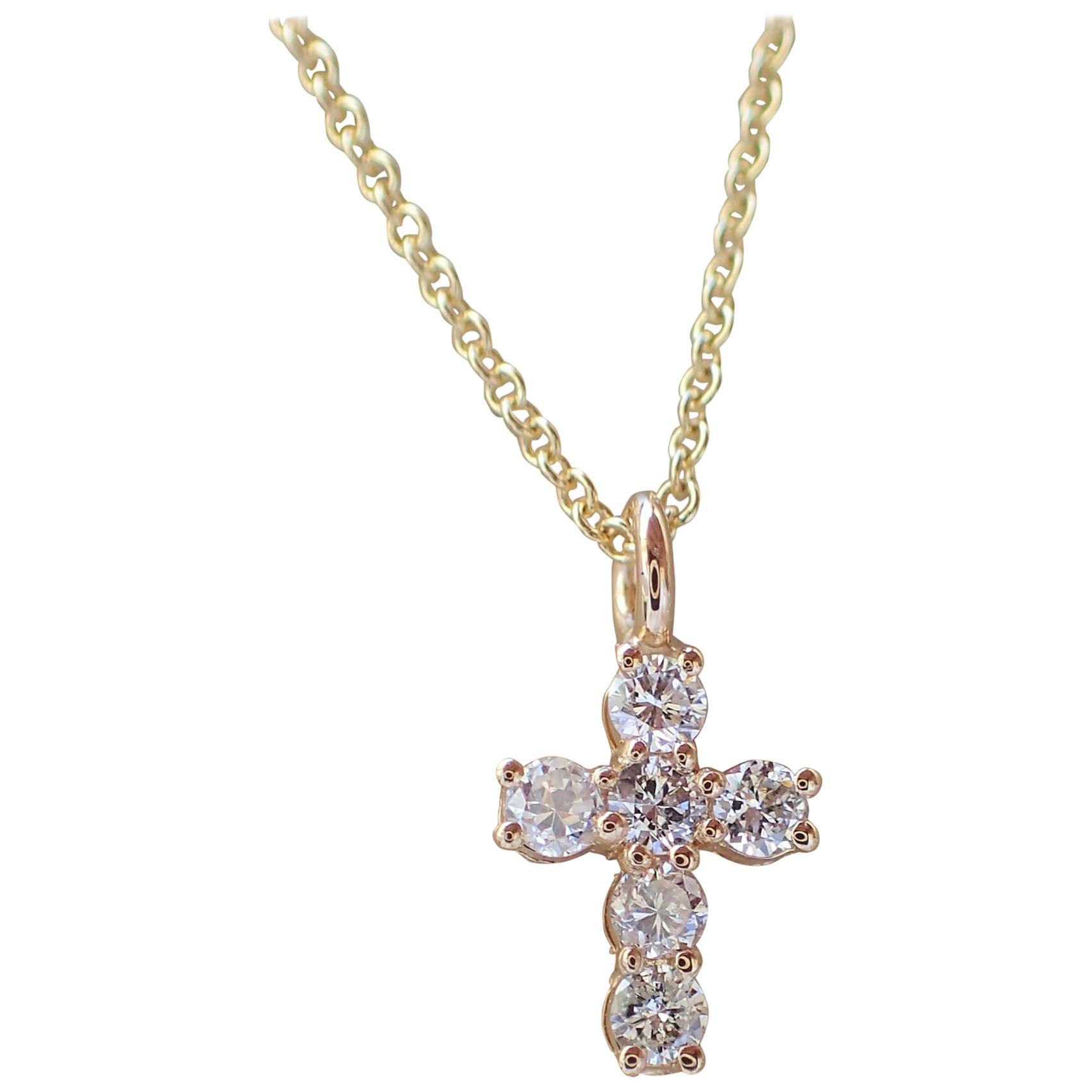 18 Karat Gold Tiny Cross with 0.30 Carat of Diamond Hangs on Chain