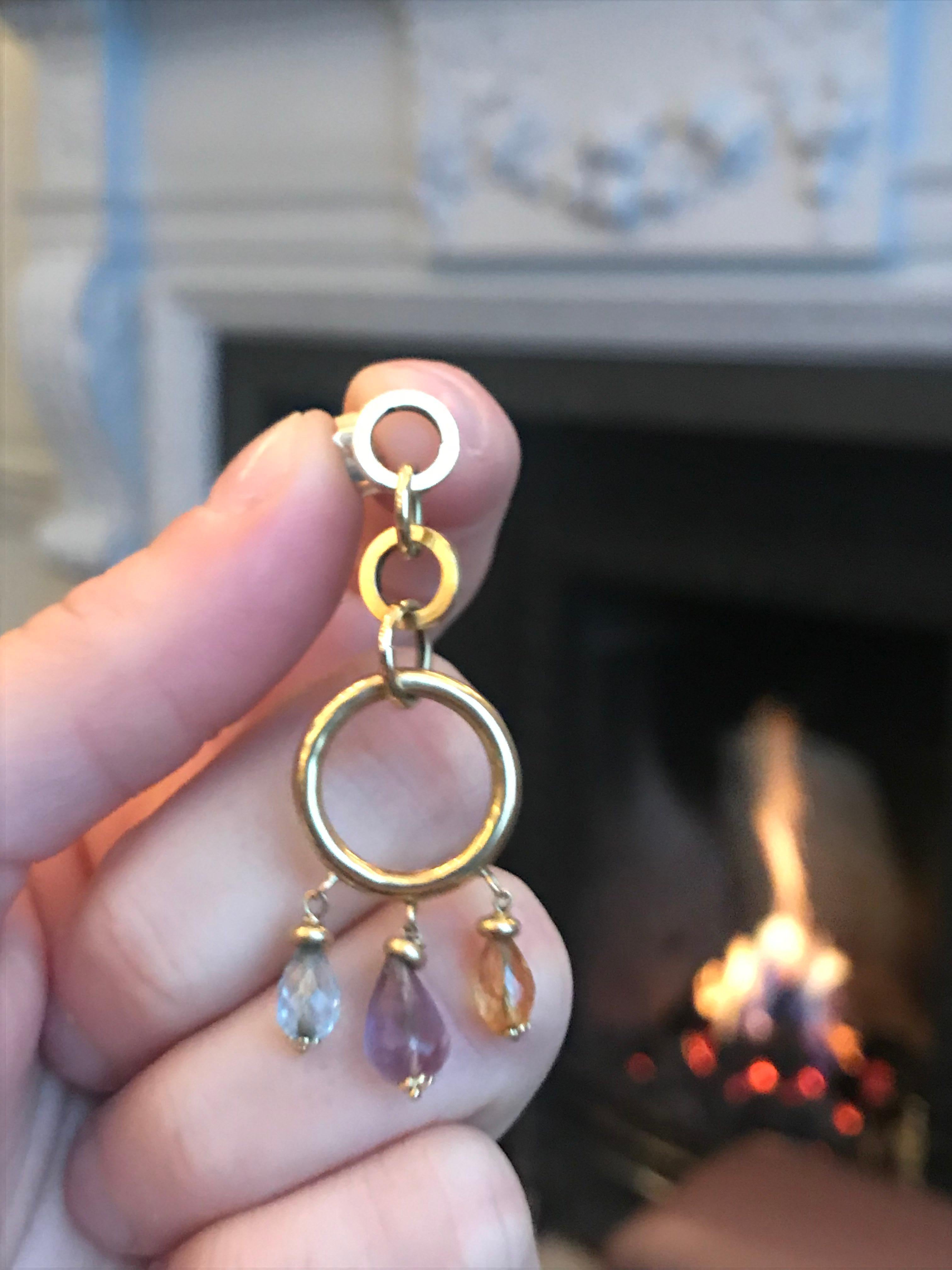 Two Amethysts, Citrines and Topaz decorate these beautiful circle chain drop earrings. Handmade in our 150 year old Italian workshop these earrings measure 25cm in length. 

About the Annellino Fine Jewellery
In a small market town south of Rome,