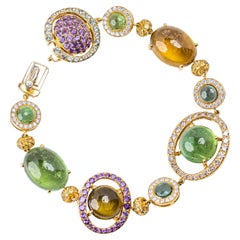 Bracciale con tormalina, diamanti e zaffiri in oro 18 carati