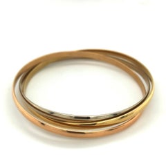 18 Karat Gold Trinity Bangle by Cartier