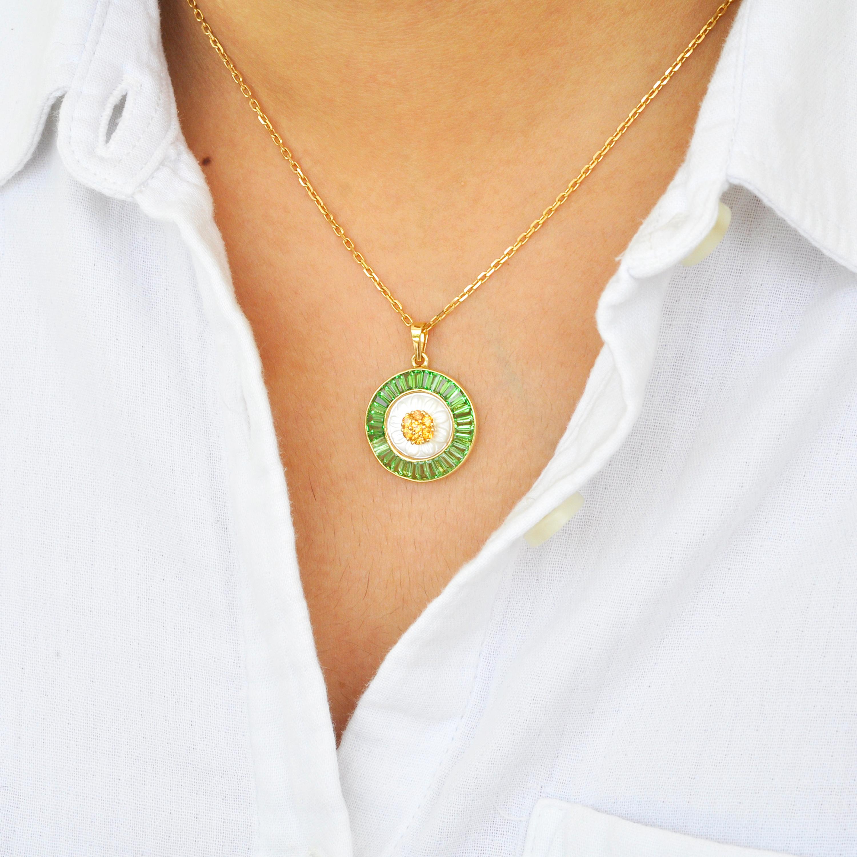 18 karat yellow gold tsavorite carved mother of pearl flower yellow sapphire pendant

This 18 karat yellow gold is a tribute to the magnificence of a Daisy flower. Exhibiting excellent craftsmanship, the pendant centres a daisy carved on mother of