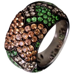 Bague cocktail en or 18 carats, tsavorite, saphir et diamants