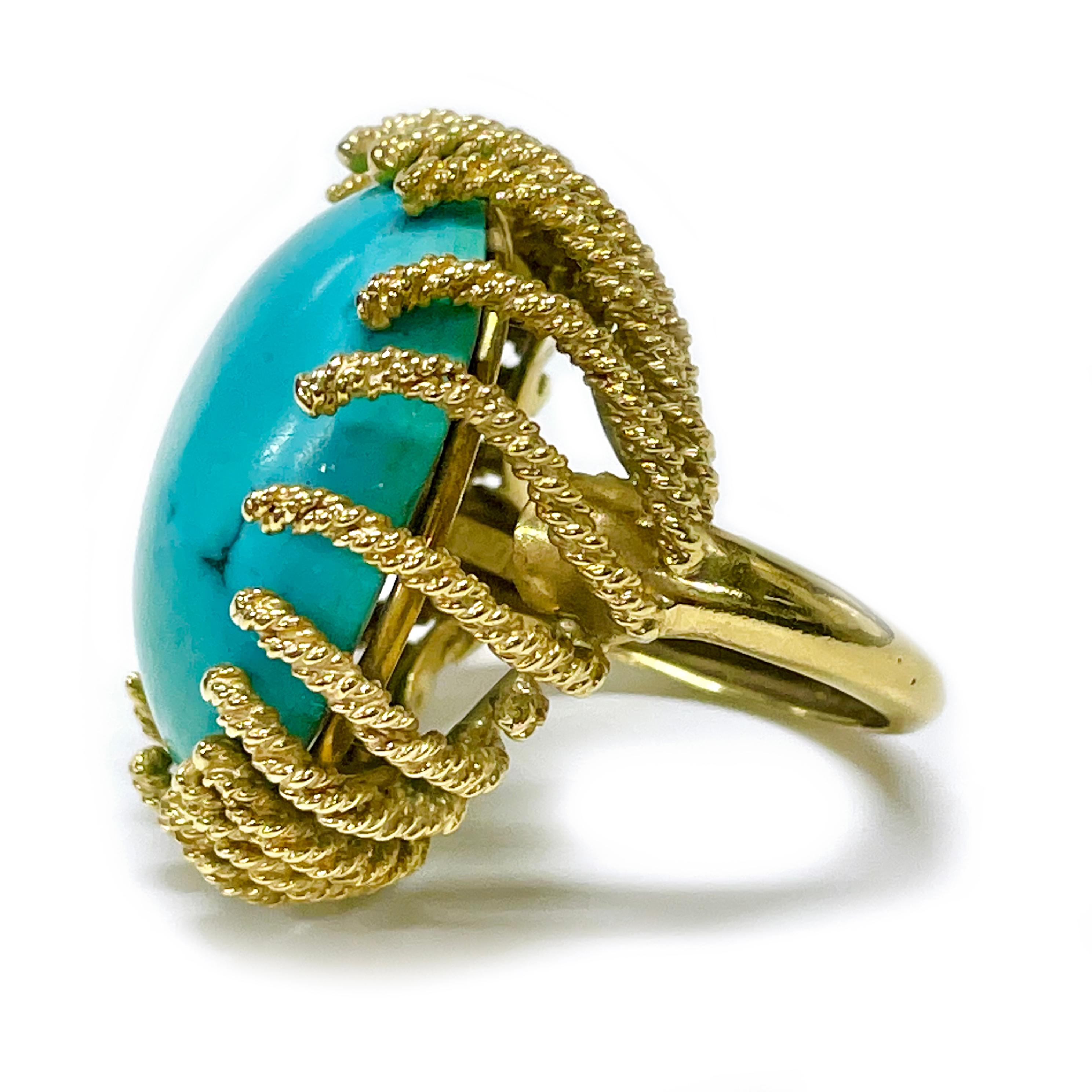 18 Karat Yellow Gold Twisted Wire Turquoise Ring. A true statement ring with twenty-two twisted gold wire prongs (one broken, visible on the second photo) that cradle a 25 x 20mm Turquoise cabochon. Stamped inside the band of the ring is WEBB18K.