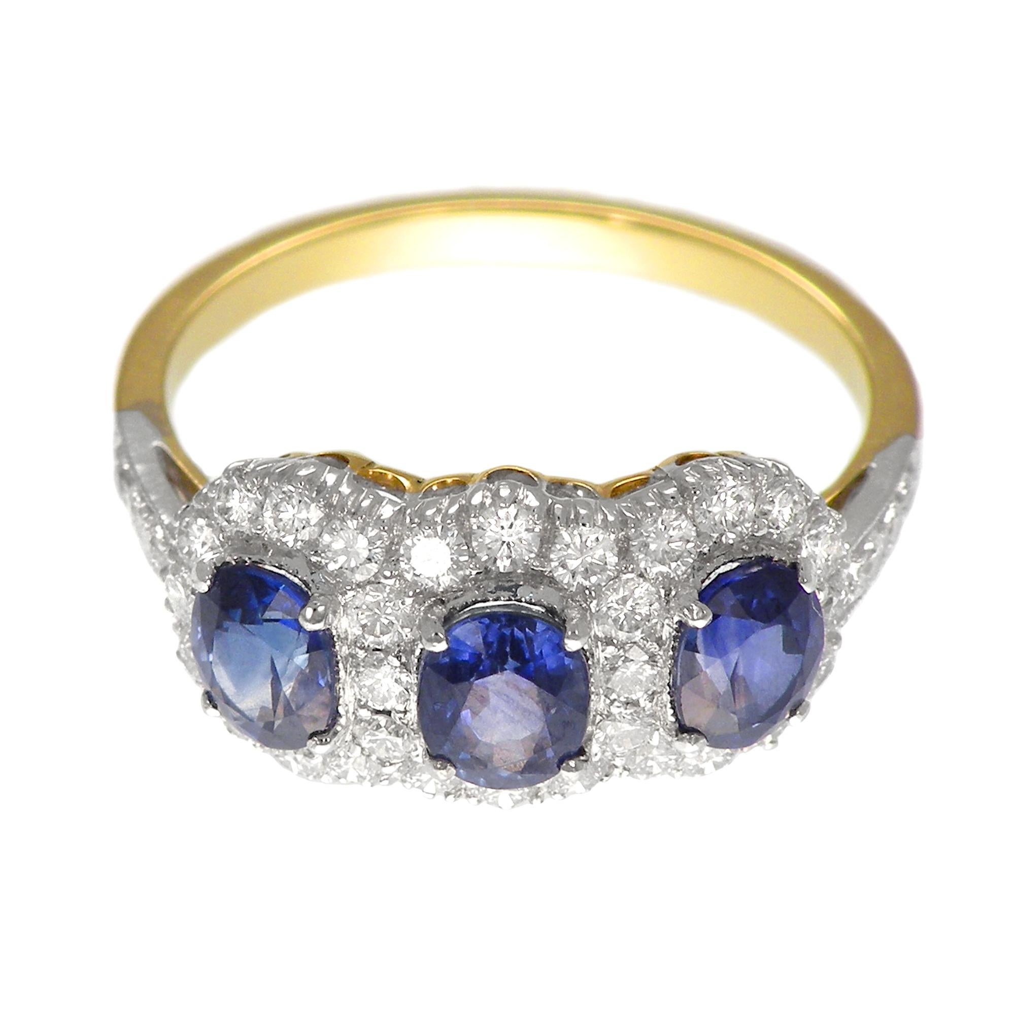 Oval Cut 18 Karat Gold Two-Tone Classic Three-Stone Sapphires and Diamond Ring For Sale