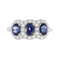 18 Karat Gold Two-Tone Classic Three-Stone Sapphires and Diamond Ring