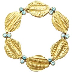 18 Karat Gold Vertebrae Link Bracelet Set with 6 Carat of Blue Zircon