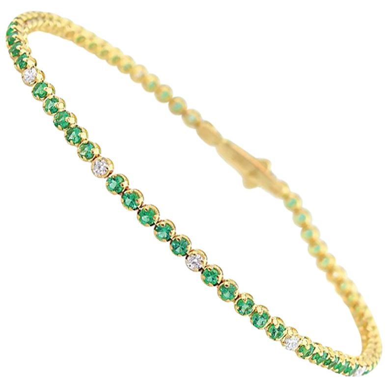 18 Karat Gold, White Diamond and Emerald Tennis Bracelet by Alessa Jewelry For Sale
