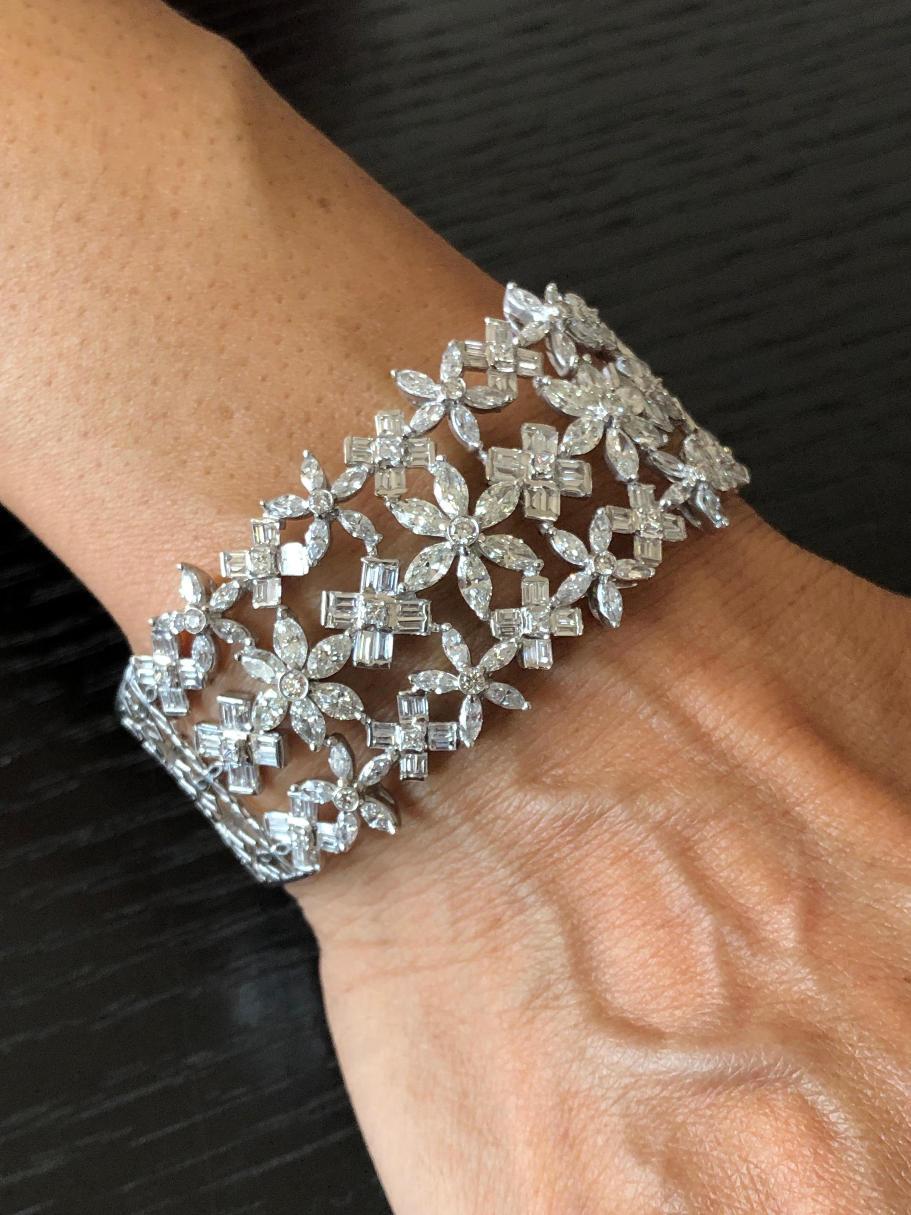 Diamond: 7.80 carats
Gold: 37.212 grams 18 Karat 
Colour: GH 
Clarity: VS-SI
Item Code: DBR- CGB

Fancy Shaped Diamonds is sure to add that sparkle to your attire with this intricately handcrafted bracelet 