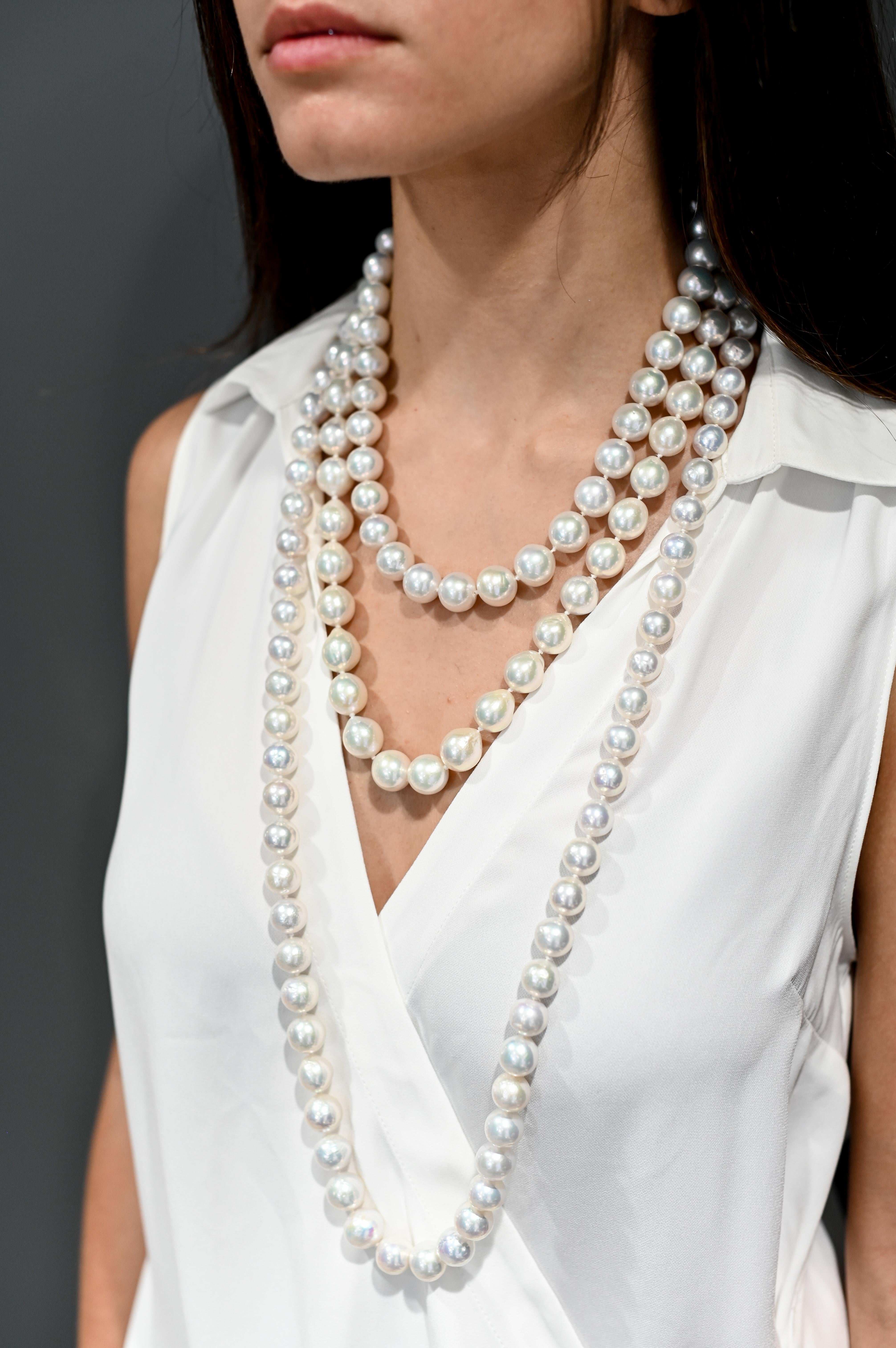 Beautifully matched in color, size, shape, and luster, this Faye Kim 18 Karat Gold White Freshwater Pearl Necklace makes a striking, elegant design statement. Ideal for every occasion, this timeless, classic piece, comprising 64 pearls, will
