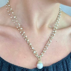 Pendentif Faye Kim en or 18 carats avec une perle blanche des mers du Sud et une monture sertie de diamants