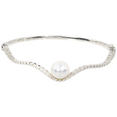 Bracelet jonc en or 18 carats avec perles des mers du Sud