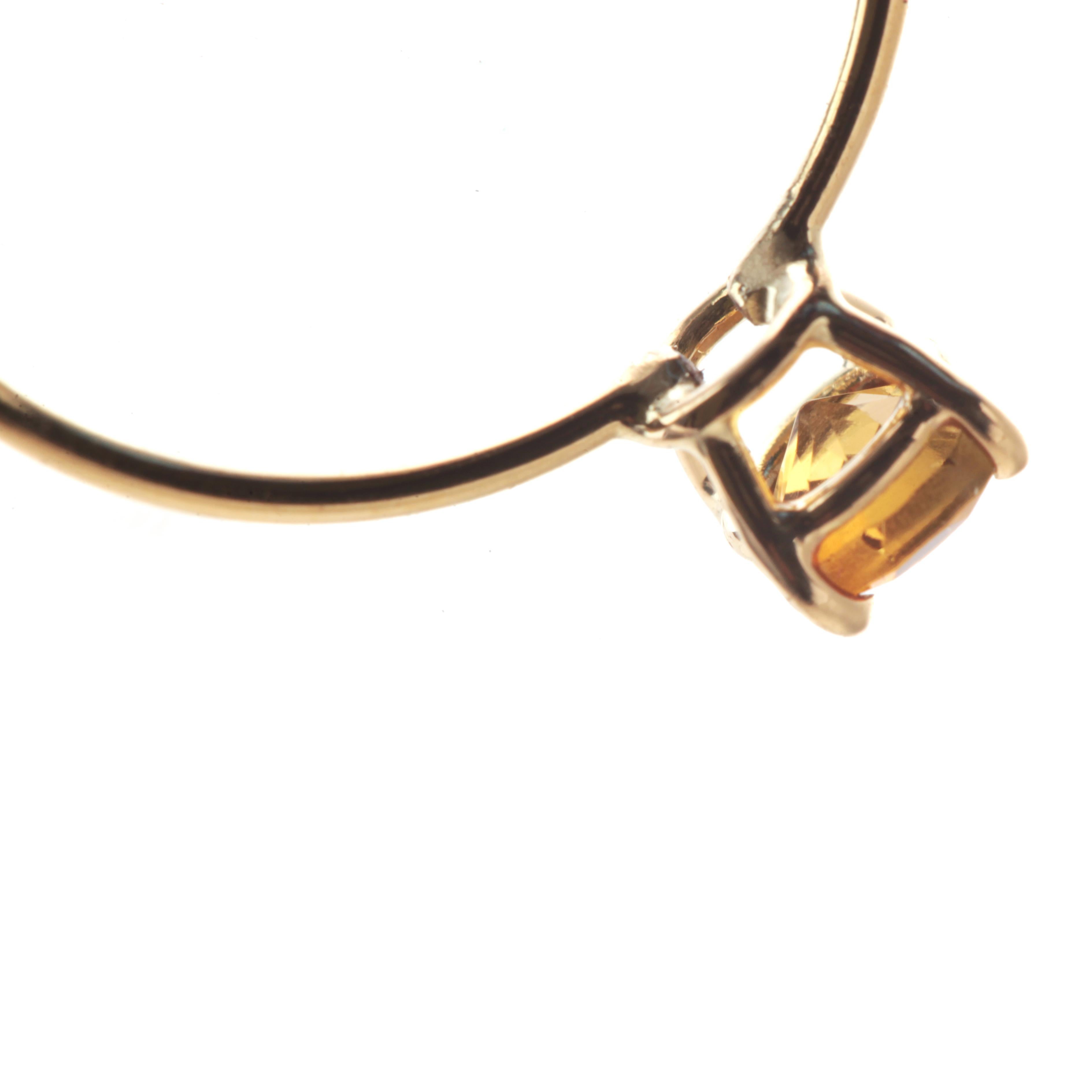 Bijoux Signature INTINI Jewels en tourmaline jaune. Bague moderne et élégante en or jaune 18 carats avec une coupe brillante et de minuscules griffes qui ornent l'anneau. Bague de cocktail, moderne et chic.

La tourmaline jaune est une pierre