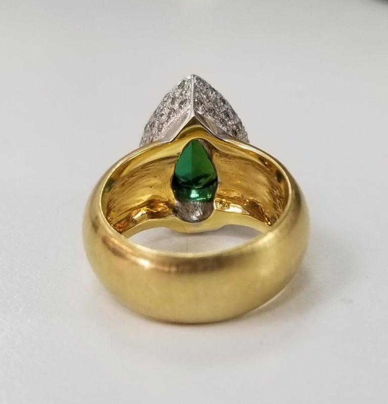 Contemporary 18 Karat Green Tourmaline with Diamond Pave' Halo