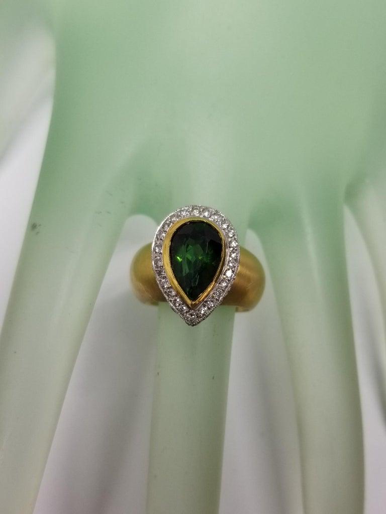 18 Karat Green Tourmaline with Diamond Pave' Halo 1