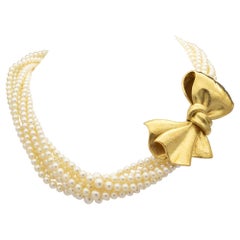 18 Karat Hammered Gold and Pearl Bow Necklace